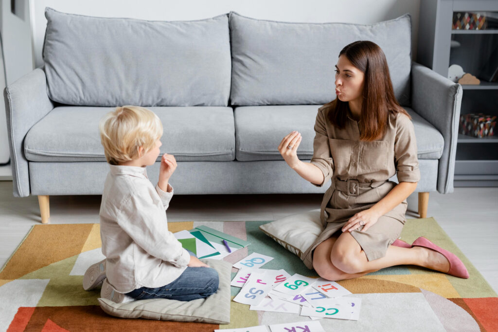 Board-certified behavior analyst working one-on-one with a child during an ABA therapy session